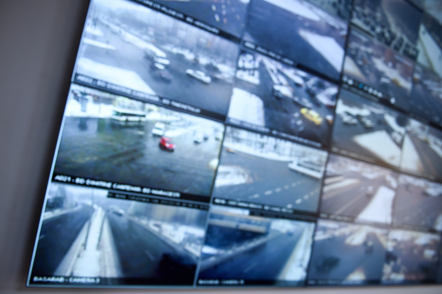 Detail shot with security surveillance monitors command center